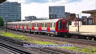 RD27773vid.  London Underground District and Piccadilly Line Trains at, Chiswick Park.