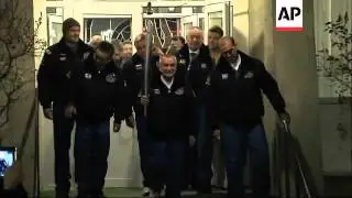 Russian Soyuz rocket carries crew with Olympic torch into space