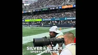 Marshawn Lynch is a photographer now? 🤔 taking pictures on the sideline during the #raiders game