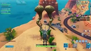 FORTBYTE #81 CERCA DE UNA CU&Ntilde;A DE CACTUS EN LA CIMA DE UNA MONTA&Ntilde;A | FORTNITE