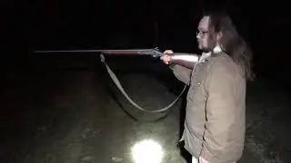 One Handing A 10 gauge shotgun.