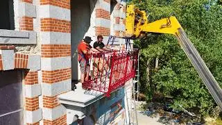 The new balcony is fitted.