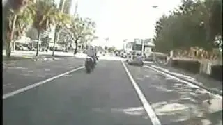 Motorcycle crashes into intersection!