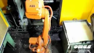 Pinza di presa a tre griffe Omas e robot ABB