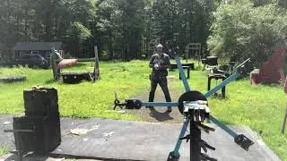 Shooting playing card in half on spinning wheel 💥