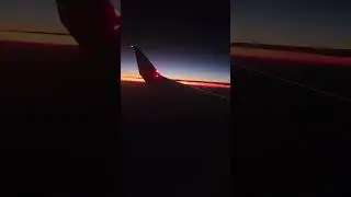 Sunset plane footage over wing ambient sound