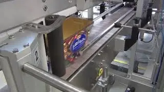 Tamper Evident Seal and Two Sides Labeling System for Chocolate Container