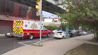 THE FIRE DEPARTMENT ON FRONT STREET  AND UNDER THE EL TRACKS IN PHILADELPHIA