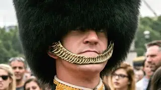 Why British Guards Wear Bearskin Hat Straps Below Their Lip