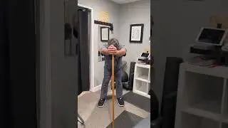 Shoulder rehabilitation with use of a stick or longevity staff.