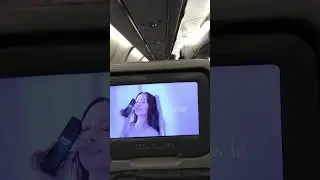 Settling-in for China Airlines flight in economy class