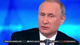 Russian President Vladimir Putin answers questions from the public
