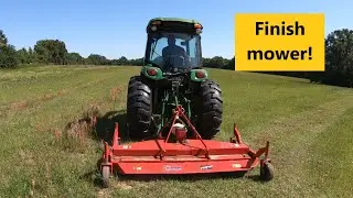 #109 Caroni finish mower on the John deere 4066R
