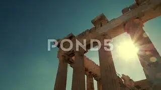 Sunburst Behind Parthenon Column at Acropolis in Greece - stock video