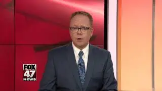 Suspect charged in Lansing shooting