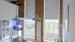 THE BLIND SHOP: Blackout roller blinds fitting to large windows London
