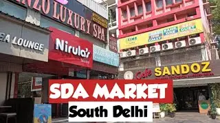 Discover SDA Market in Hauz Khas:A vibrant hub of cafes, banks, offices near IIT Gate Metro Station.