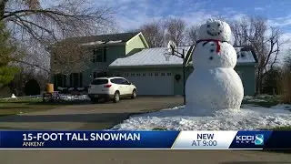 Iowa family constructs massive 15-foot snowman