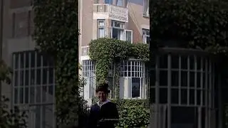 Walking down a street in Bergen, Netherlands in 1919 - Restored Footage