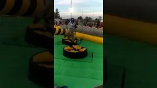 Kid on inflatable game