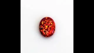 Fornasis fire opal cabochon created gemstone
