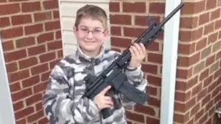 Cops called over photo of boy with rifle