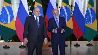 Brazil's Lula shakes hands with Russian PM during visit | AFP