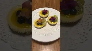 Mini cheesecakes: three ways! 1) blueberry 2) raspberry/strawberry and 3) mango/blueberry/kiwi