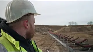 Montage eines F&ouml;rdergurtes mit dem Unimog | Peter Mahnke GmbH