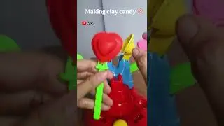 Making doraemon clay rose candy in candy machine #shorts #creativeclayideas