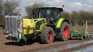 Maize Under Plastic.   John Deere 6150R and Claas Arion 650