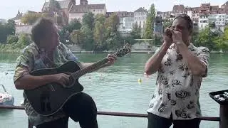 Steve Arvey On The Streets Busking On The Rhine River In Basel Switzerland With Dieter On Harmonica