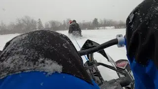 Towing a GT Snow racer behind a snowmobile