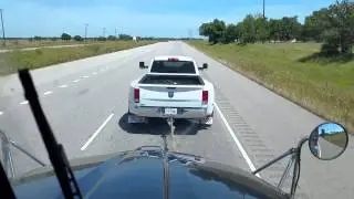 Dodge RAM 3500  towing a Kenwoorth.