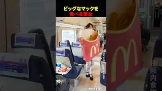 ビッグなマックを食べる大食い女性
