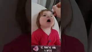 Cute baby is happy to take her medicine drop