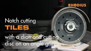 Notch cutting tiles with a diamond cutting disc on an angle grinder