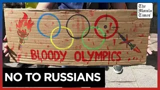 Ukrainians in France protest against Russian athletes taking part in Olympics