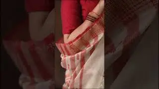 Milky White handwoven Maheshwari silk saree with red textured border
