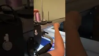 Threading an aluminum M bobbin using Glide thread.