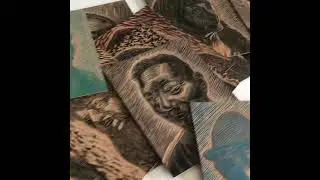 Woodcut portrait of 100 faces
