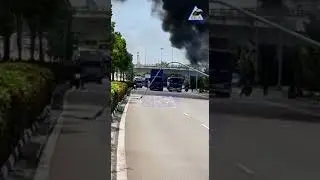 Lamp post collapsed after Trailer Truck crash through railing and burst into flame