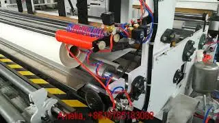 JRT roll rewinder + automatic band saw running in PERU