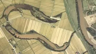Why Rivers Curve