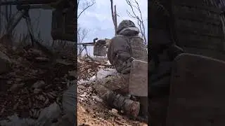Ukrainian gunner repels Russian assault with heavy fire as comrade pulls trigger on grenade launcher