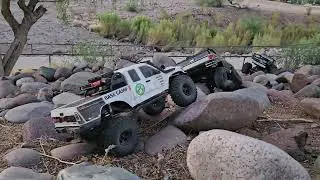 Axial BaseCamp Redcat Everest 10 and FMS K5 Blazer trialing through the rocks