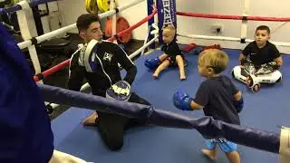 Henry doing pad work with Makis at northside