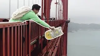 BOARD FLIP OFF GOLDEN GATE BRIDGE