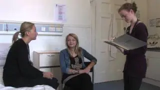 Demonstrating good communication with a pregnant woman who is deaf