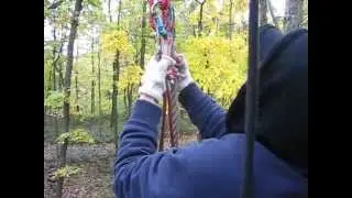 Jessica jumping off the Tarzan Rope, #1 - at Tree Tops Adventure Course